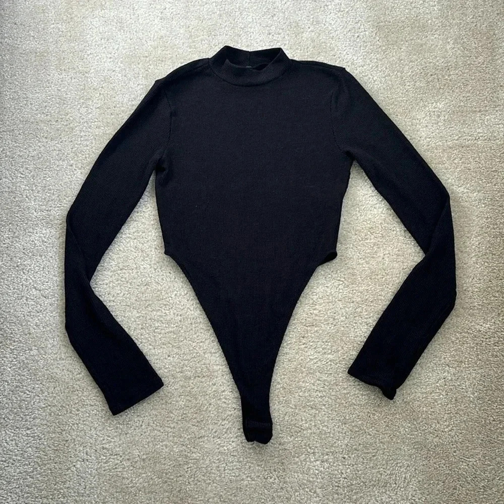 NWOT Blanc Bodysuit